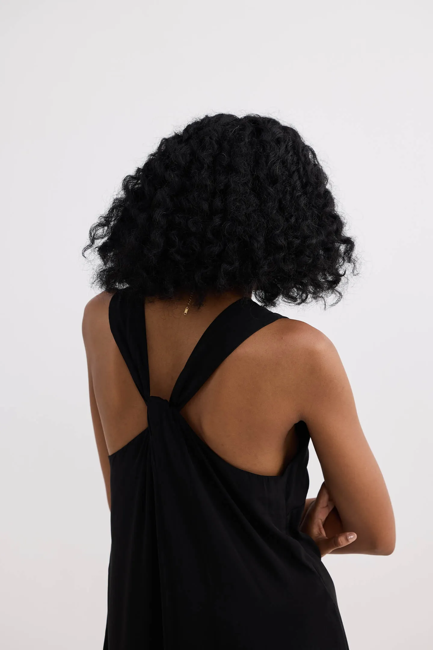 Crossed in Chic Sleeveless Maxi Dress in Black